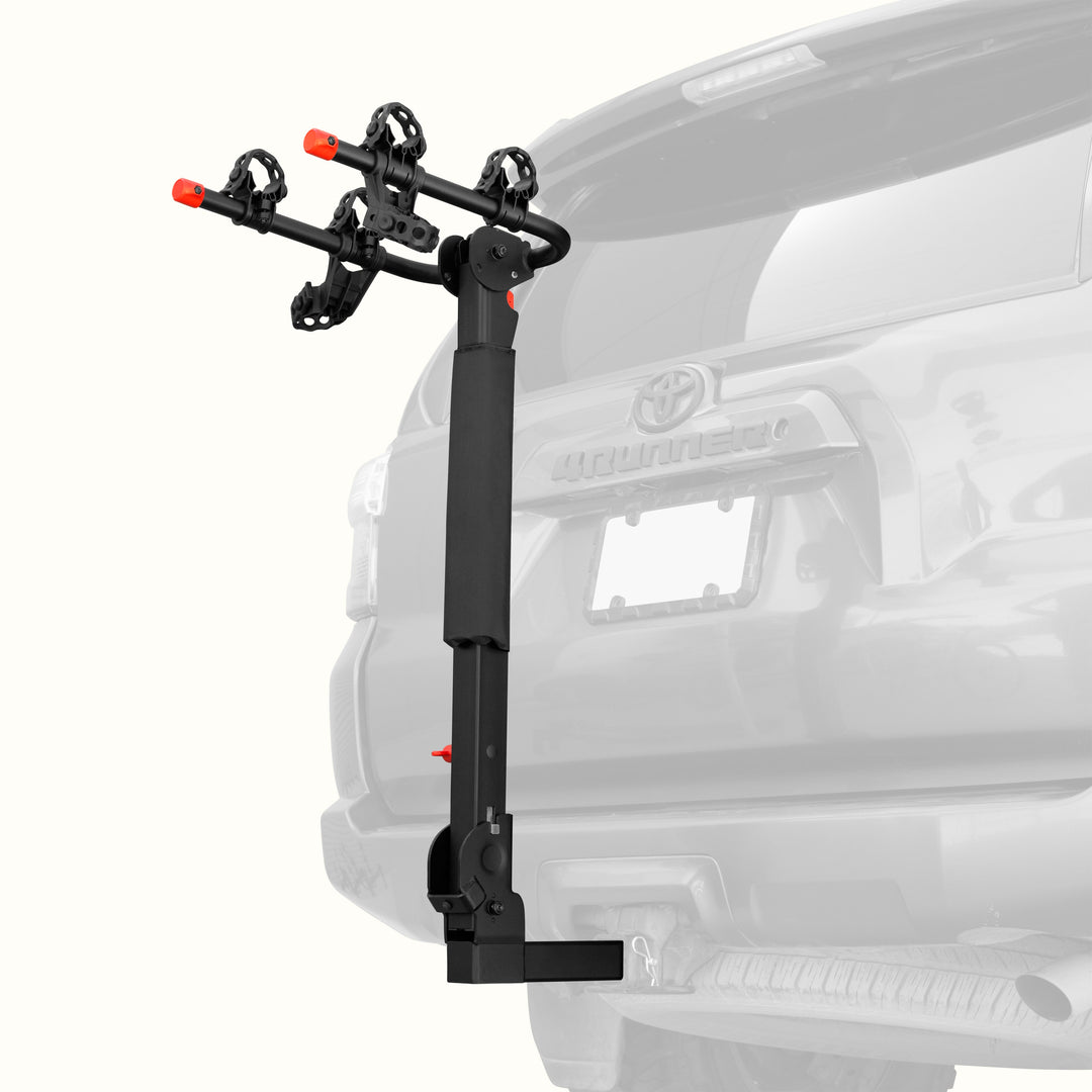 retrospec Lenox Plus Hitch Mount Car Bike Rack (2-Bikes) installed on the rear hitch of an SUV, shown empty with cradle arms extended and ready to load.