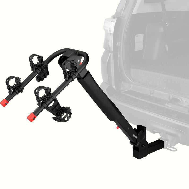retrospec Lenox Plus Hitch Mount Car Bike Rack (2 Bikes) installed on the rear hitch of a Toyota 4Runner, shown empty from a rear angle with cradle arms raised and red safety caps in place.