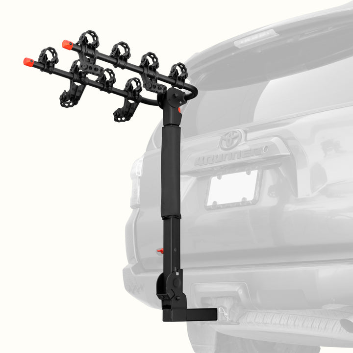 retrospec Lenox Plus Hitch Mount Car Bike Rack (4-Bikes) installed on the rear hitch of an SUV, shown empty with cradle arms extended and ready to load.