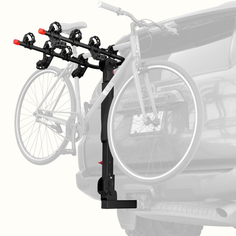retrospec Lenox Plus Hitch Mount Car Bike Rack (4-Bikes) installed on an SUV with one bike secured in the padded frame cradles, shown from a rear three-quarter angle.