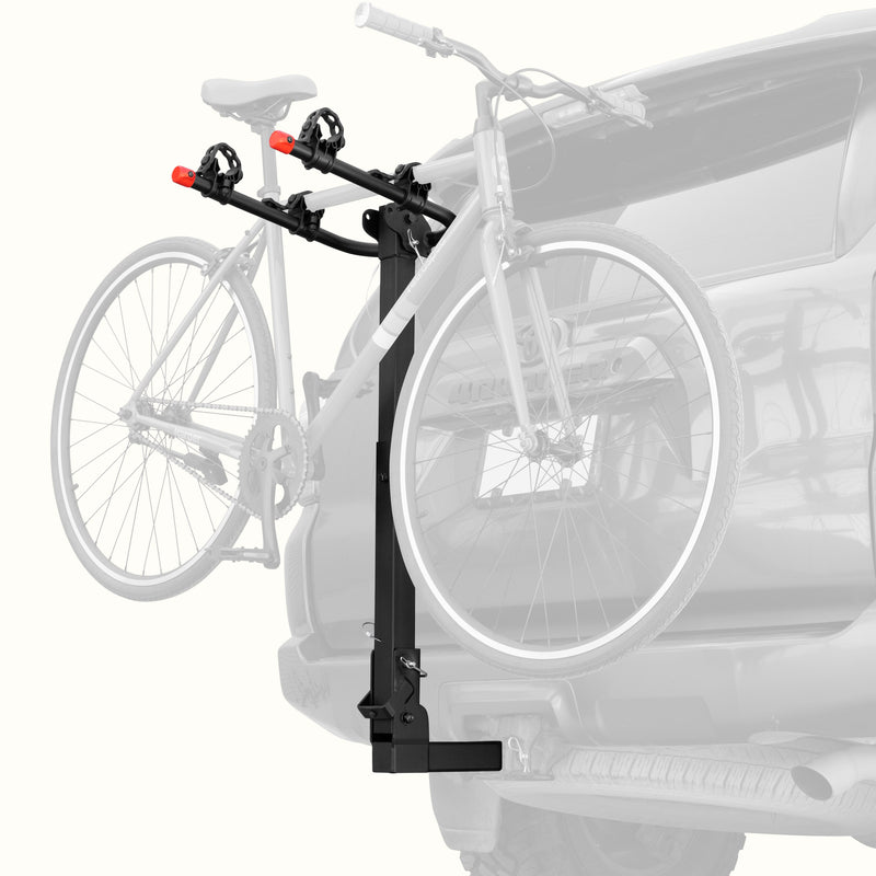 retrospec Lenox Hitch Mount Car Bike Rack (2-Bikes) installed on an SUV with one bike secured in the padded frame cradles, shown from a rear three-quarter angle.