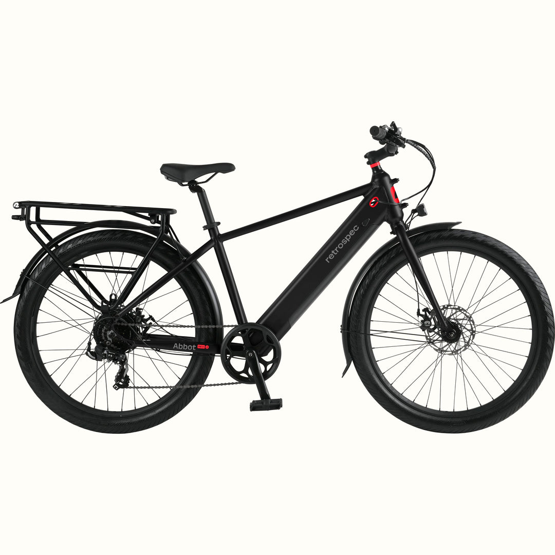 Black Abbot Rev 2 Commuter Electric Bike with red accents and rear rack on a white background.