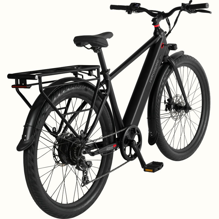 Black Abbot Rev 2 Commuter Electric Bike with red accents and rear rack on a white background.