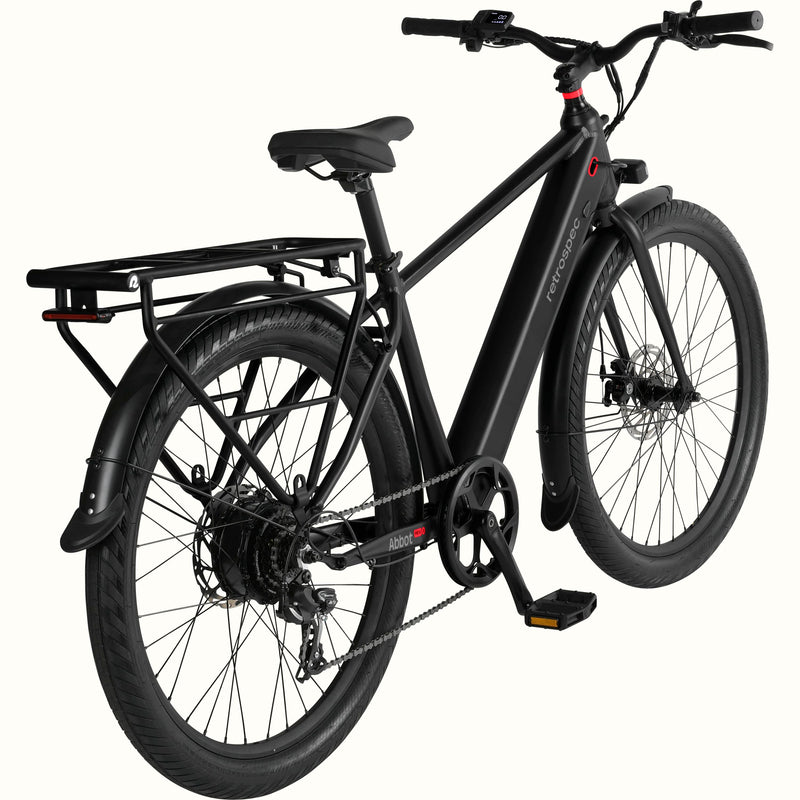 Black Abbot Rev 2 Commuter Electric Bike with red accents and rear rack on a white background.