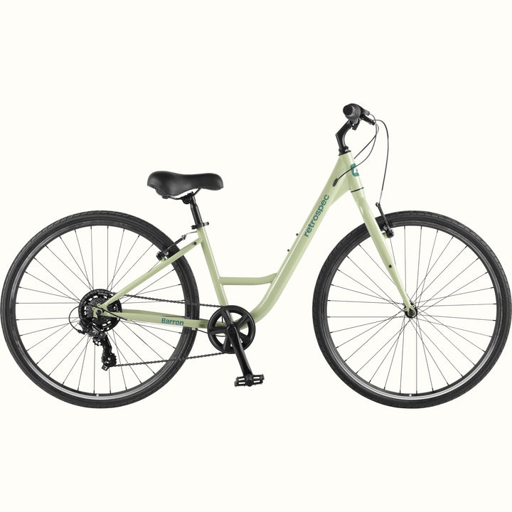 retrospec Barron commuter bike in aloe green with a step through frame and black tires
