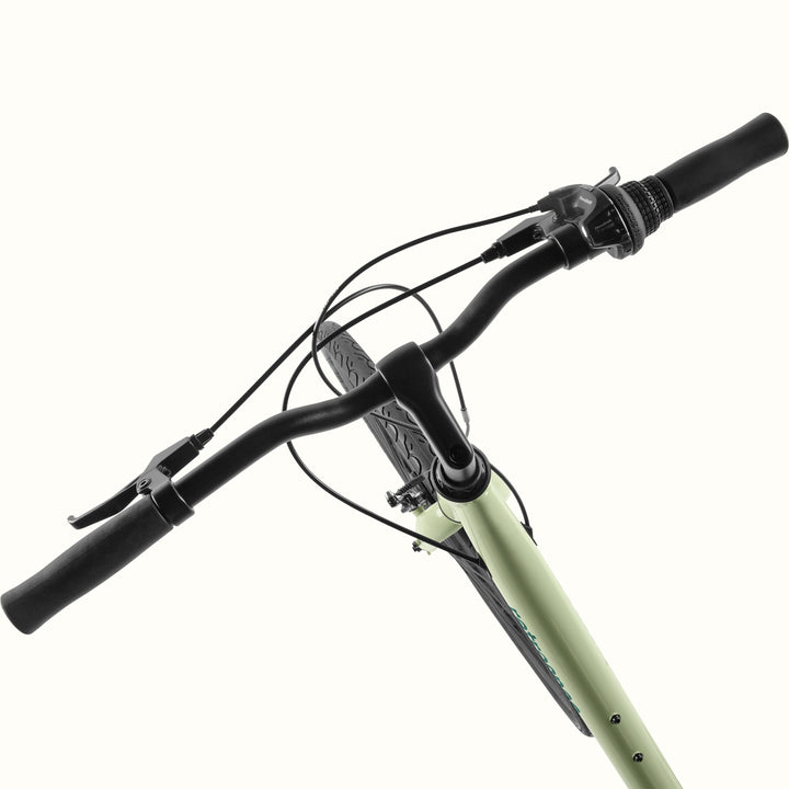 close-up of the retrospec Barron aloe green handlebars with RevoShift 7 speed shifter
