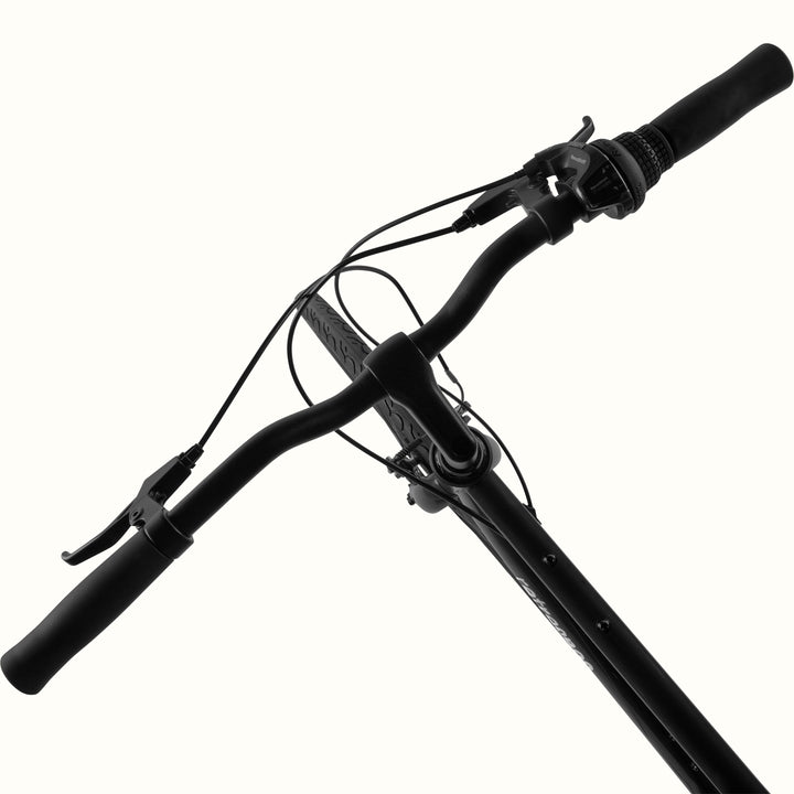 close-up of the retrospec Barron matte black handlebars with RevoShift 7 speed shifter and brake levers
