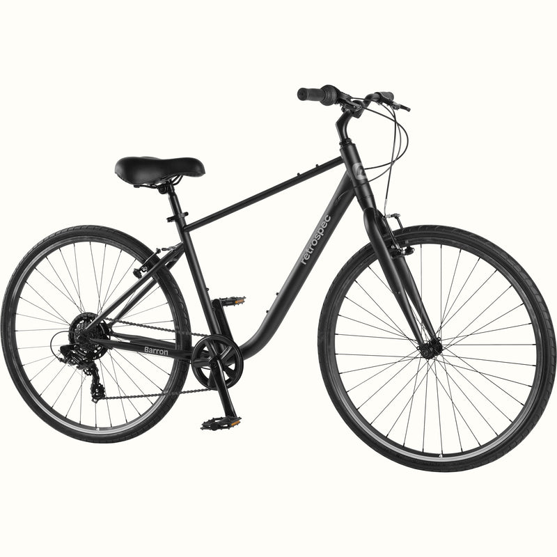 retrospec Barron hybrid bike for men in matte black, with step-over frame, Shimano drivetrain, and upright cruiser bars.