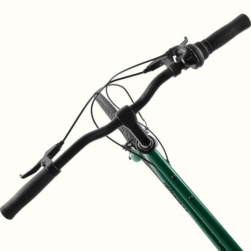 close-up of the retrospec Barron sycamore green handlebars with RevoShift 7 speed shifter
