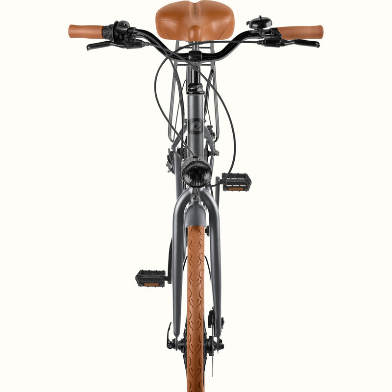 Front view of the retrospec Beaumont Plus city bike showing swept handlebars, brown grips, bell, and headlight.