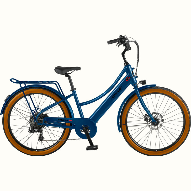 Blue Beaumont Rev+ Electric bicycle with brown tires and a rear rack on a white background.