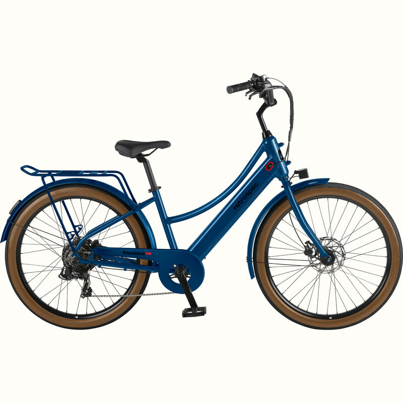 Blue Beaumont Rev+ Electric bicycle with brown tires and a rear rack on a white background.