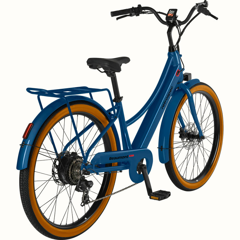 Blue Beaumont Rev+ Electric bicycle with brown tires and a rear rack on a white background.