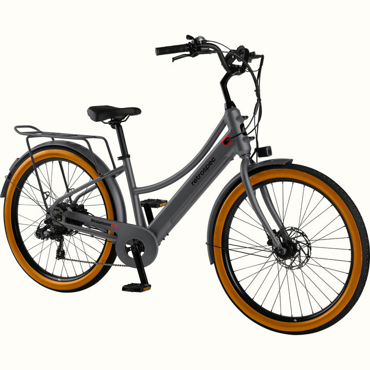 Gray Beaumont Rev+ Electric bicycle with brown tires and a rear rack on a white background.