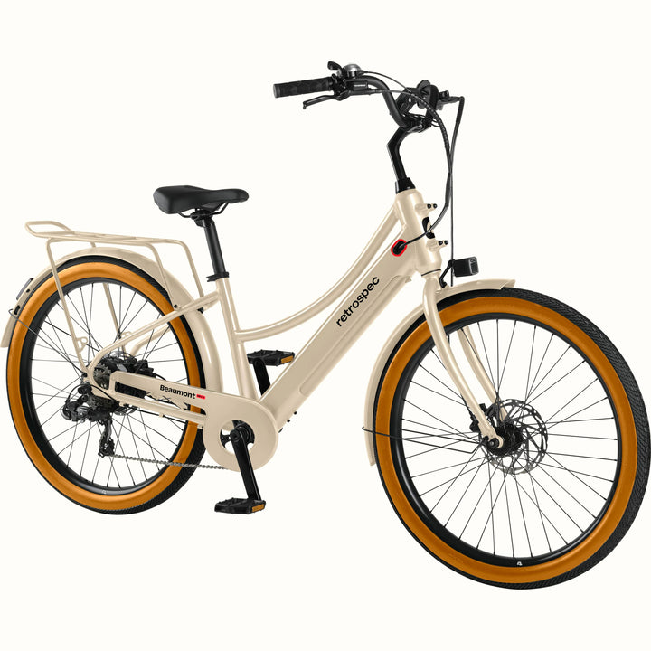 Beige Beaumont Rev+ Electric bicycle with brown tires on a white background.