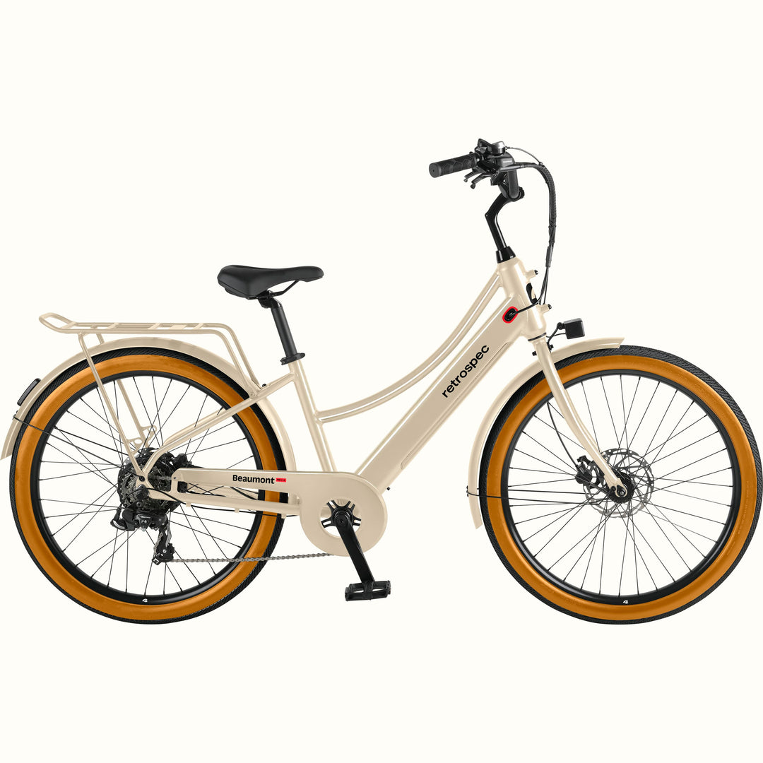 Beige Beaumont Rev+ Electric bicycle with brown tires on a white background.