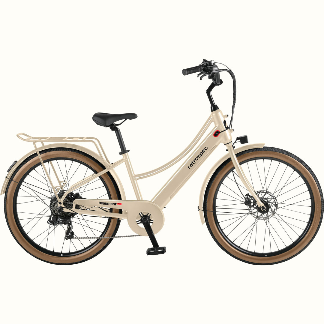 Beige Beaumont Rev+ Electric bicycle with brown tires on a white background.