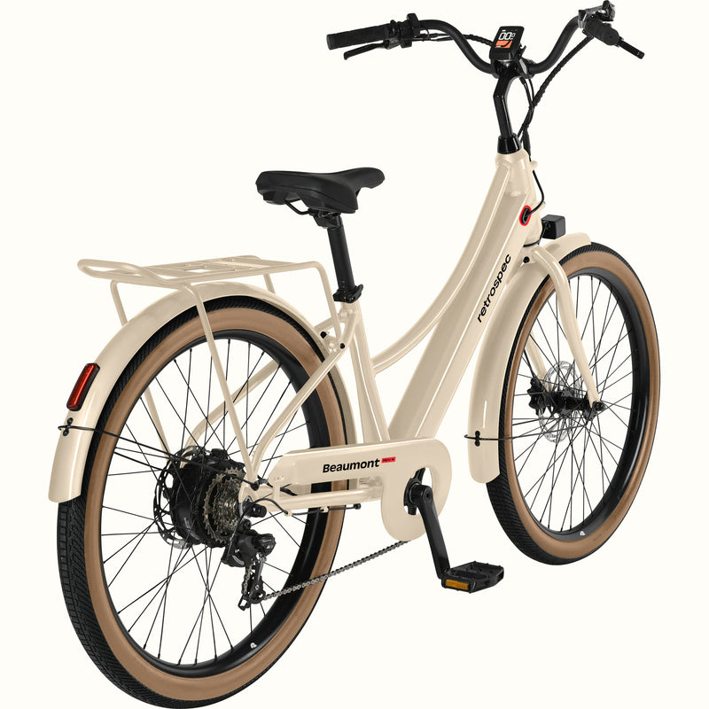 Beige Beaumont Rev+ Electric bicycle with brown tires  and a rear rack on a white background.