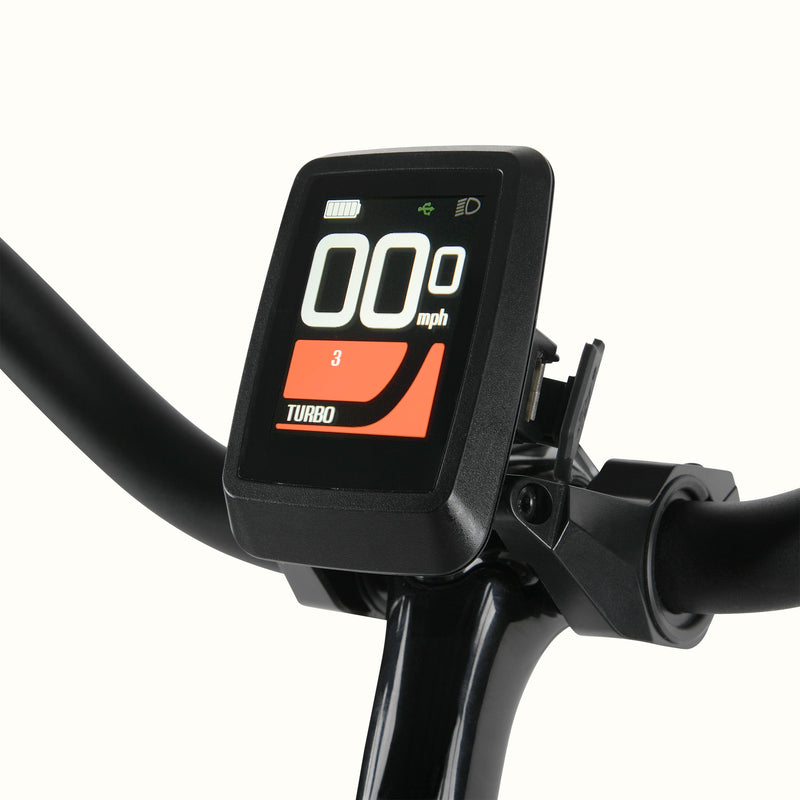 Digital display on the Beaumont Rev+ electric bicycle's handlebar with speed and turbo indicator.