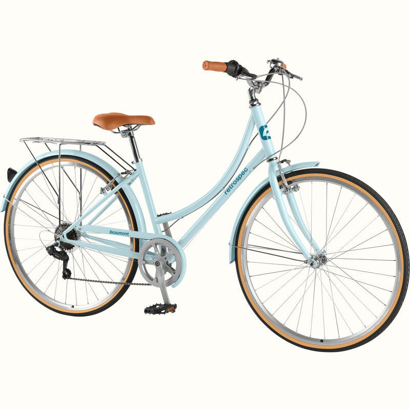retrospec Beaumont Step Through Dutch Bike handlebars with brown grips, bell, and front brake levers in larimar blue.

