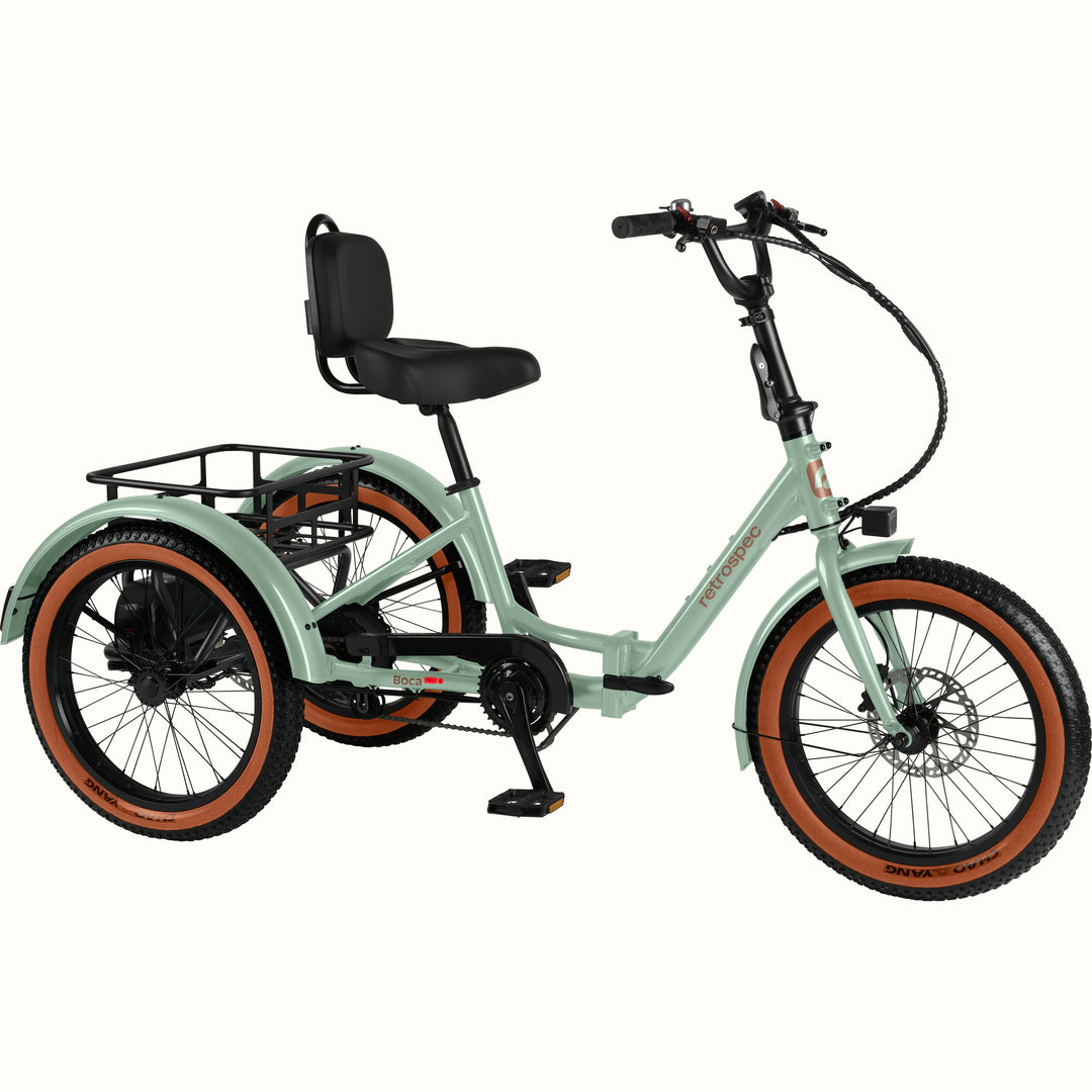 The Matcha Boca Rev 2 Electric Tricycle with a rear basket and brown accents on the tires shown on a white background.