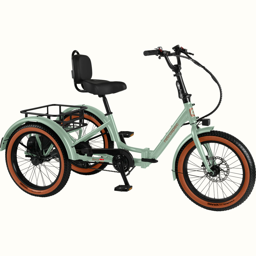The Matcha Boca Rev 2 Electric Tricycle with a rear basket and brown accents on the tires shown on a white background.