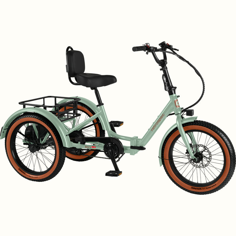The Matcha Boca Rev 2 Electric Tricycle with a rear basket and brown accents on the tires shown on a white background.