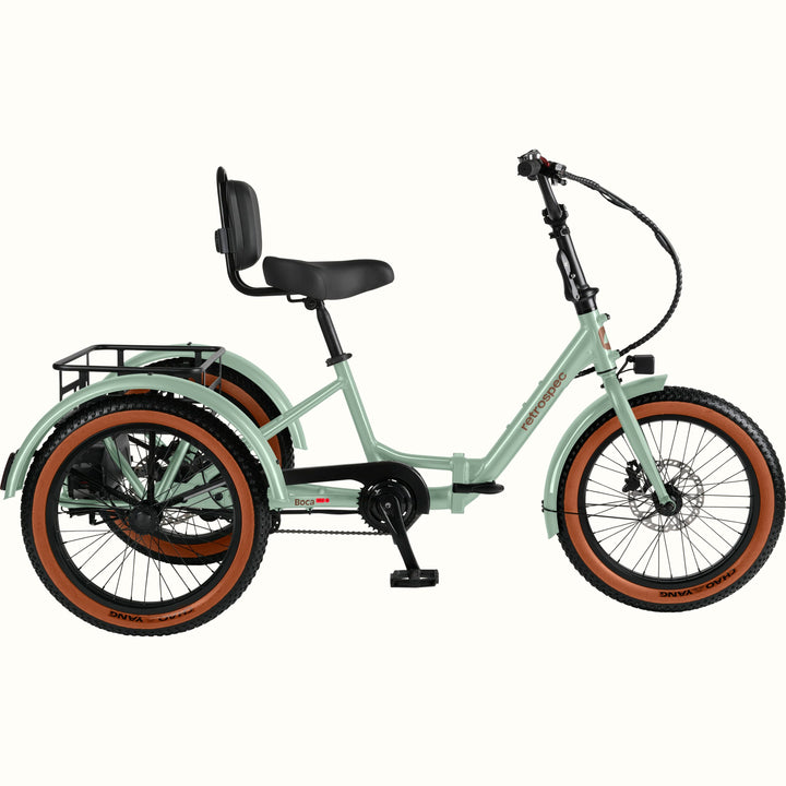 The Matcha Boca Rev 2 Electric Tricycle with a rear basket and brown accents on the tires shown on a white background.