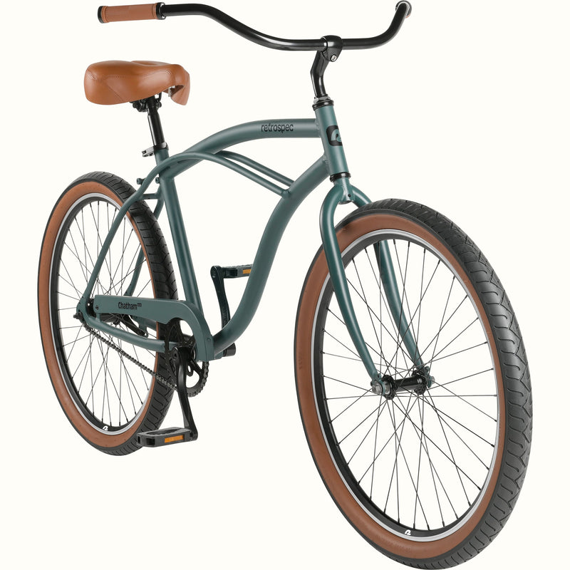 retrospec Chatham Plus single speed cruiser bike close-up showing matte everglade frame, chain, and pedals

