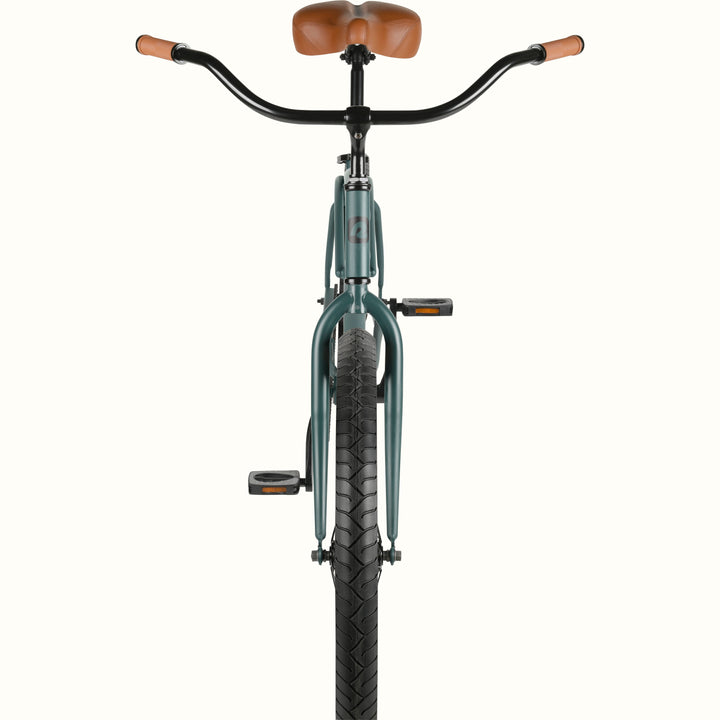 Front view of a green bicycle with black handlebars and a brown saddle.