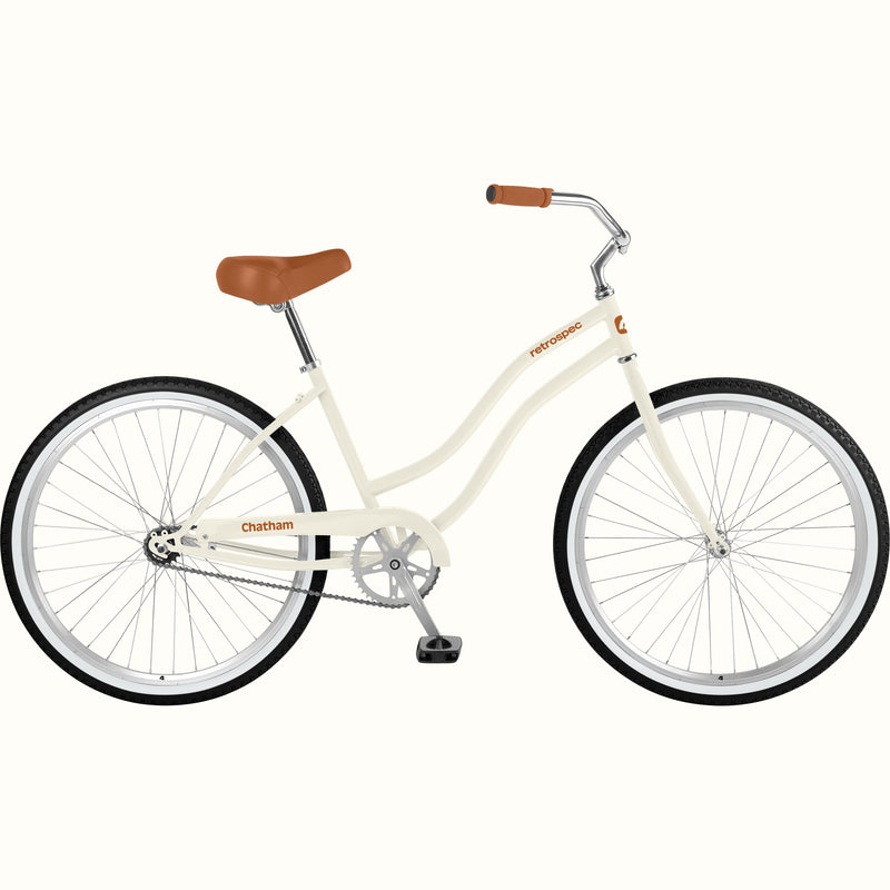 retrospec Chatham beach cruiser bike in eggshell white with brown saddle and cream frame