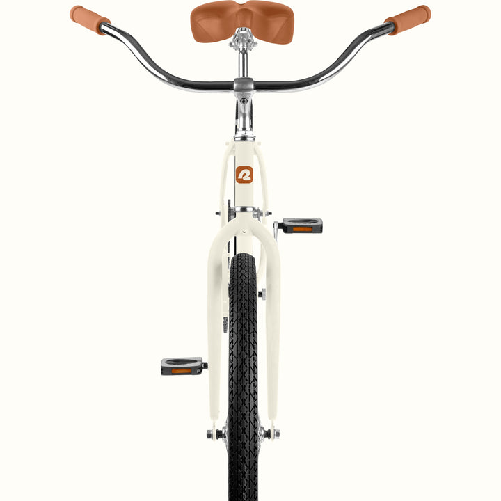 retrospec Chatham women's cruiser bike handlebar and saddle close-up in eggshell white