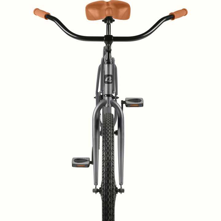 Front view of the retrospec Chatham beach cruiser in matte graphite with wide black handlebars, tan grips, and a tan saddle.