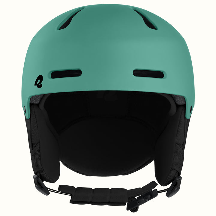 A matte mint green ski helmet with black ventilation slots, a black interior padding, and a black chin strap, shown against a plain off-white background.