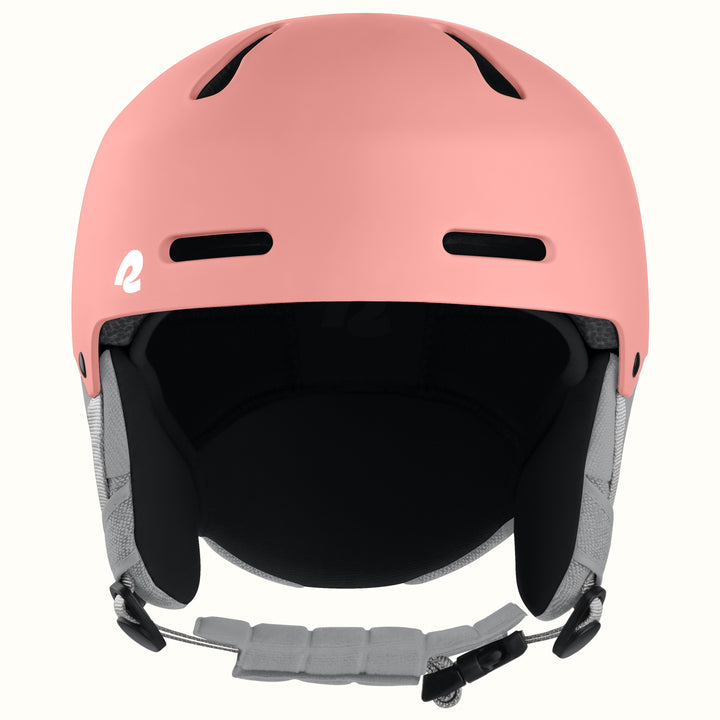 A matte pink ski helmet with a black interior padding and gray chin strap, shown from the front on a light off-white background.