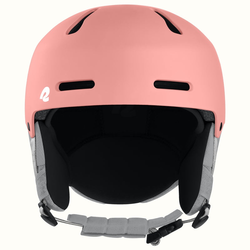 A matte pink ski helmet with a black interior padding and gray chin strap, shown from the front on a light off-white background.