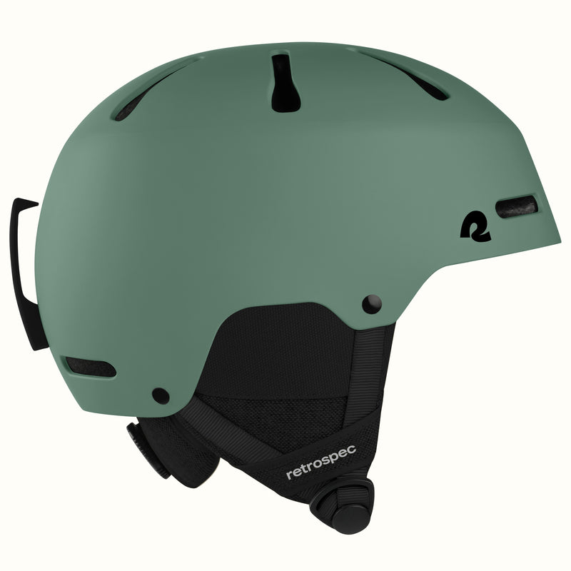 retrospec Comstock ski helmet in matte summit grove, side view showing adjustable dial and top vents.