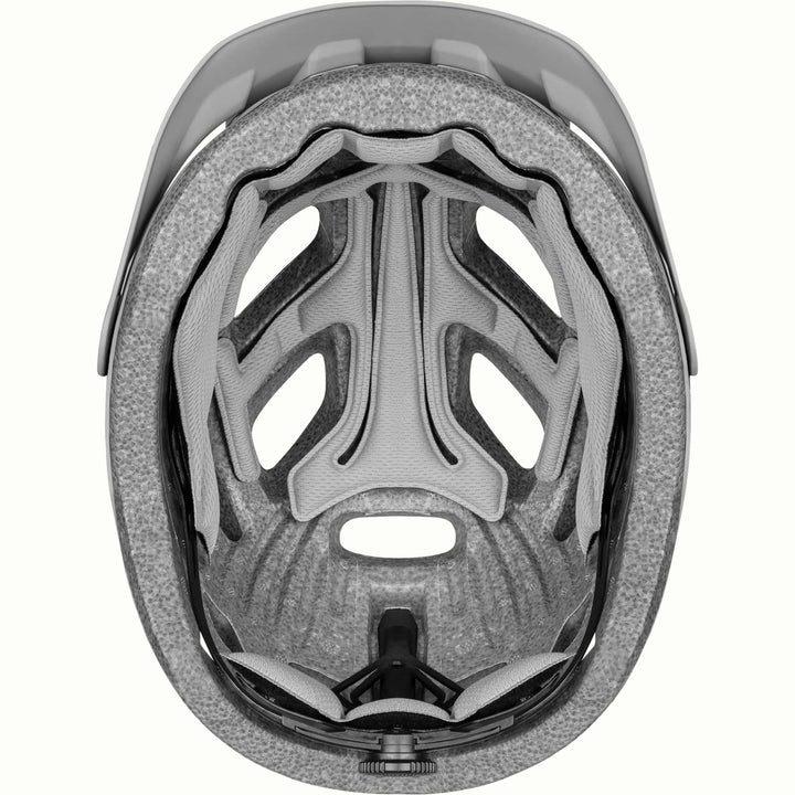 Interior view of a Lennon Commuter Bike Helmet in Matte Stone Gray, showing the structured foam padding, ventilation channels, and fit system against a clean background.
