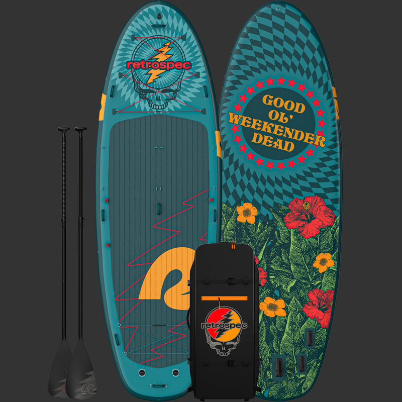 A front and rear view of the Grateful Dead Weekender Crew XL Multi-Person Inflatable Stand Up Paddle Board 15’ with "Good Ol' Weekender Dead," a "Steal Your Face" icon and flower designs, accompanied by two paddles and a black carrying bag with the "Steal Your Face" artwork and "retrospec" branding.