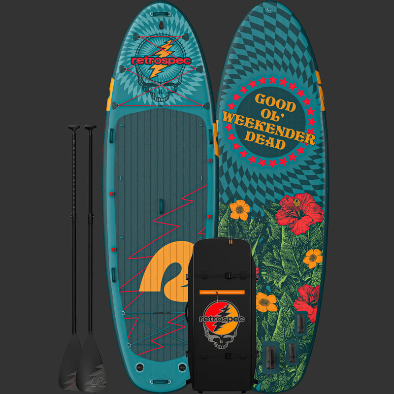 A front and rear view of the Grateful Dead Weekender Crew Multi-Person Inflatable Stand Up Paddle Board with "Good Ol' Weekender Dead," a "Steal Your Face" icon and flower designs, accompanied by two paddles and a black carrying bag with the "Steal Your Face" artwork and "retrospec" branding.