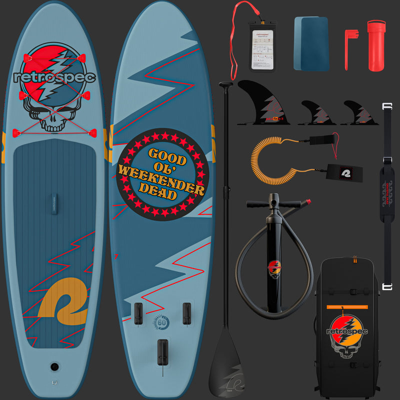 A front and rear view of the vibrant blue Grateful Dead Weekender Inflatable Paddle Board featuring the iconic Grateful Dead "Steal Your Face" artwork and "Good Ol' Weekender Dead" text, accompanied by a paddle and backpack, set against a dark background with included accessories such as paddle, pump, fins, carry bag, leash, patches, repair kit, and cell phone case.