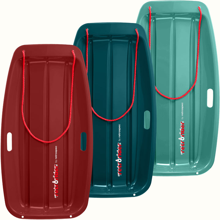 Three Retrorider Toboggan Snow Sled - 35” with a red rope on a white background.