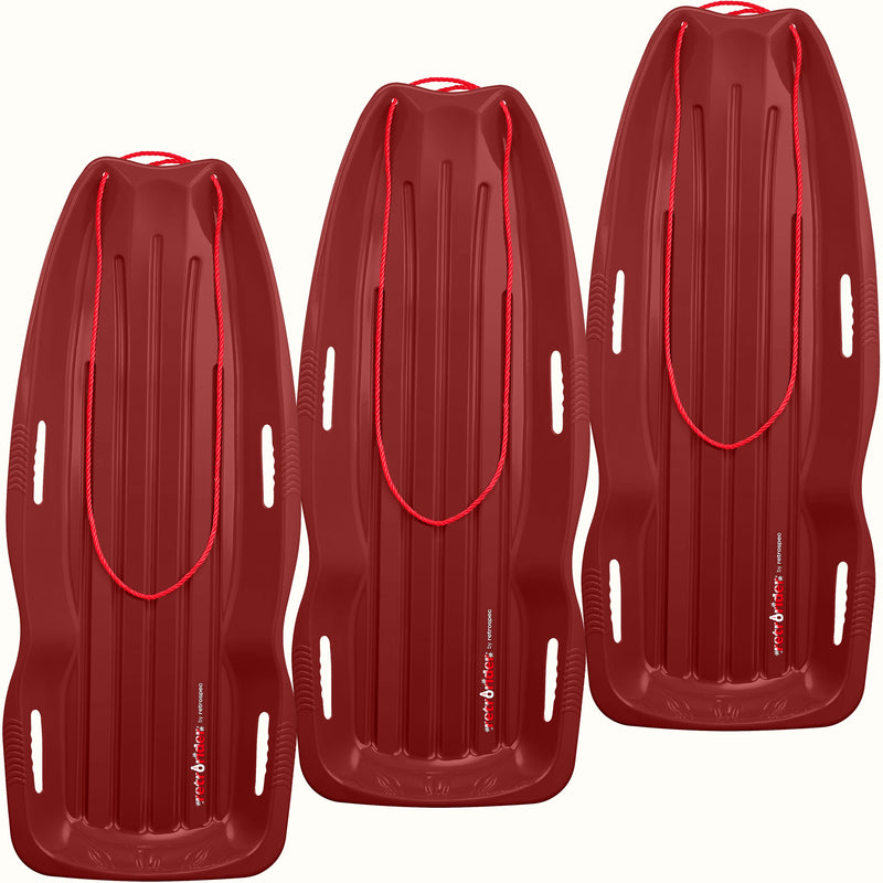 Three Retrorider Toboggan Snow Sled - 48” in Burgundy with a red rope on a white background.