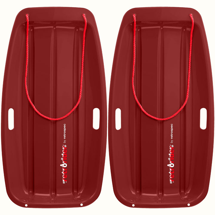 Two Retrorider Toboggan Snow Sled - 35” in Burgundy with a red rope on a white background.