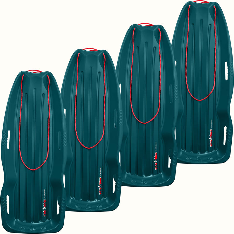 Four Retrorider Toboggan Snow Sled - 48” in Snowy Spruce with a red rope on a white background.