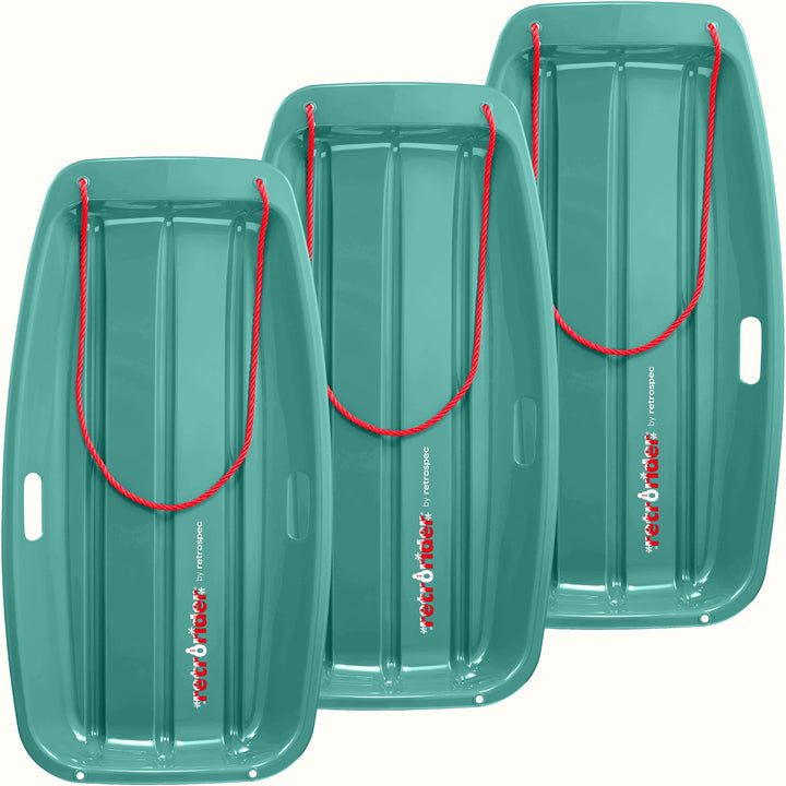 Three Retrorider Toboggan Snow Sled - 35” in Winter Tide with a red rope on a white background.