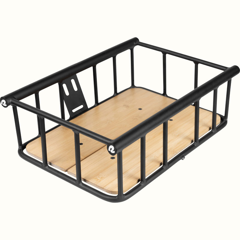 Black metal e-bike basket with wooden base on a white background.