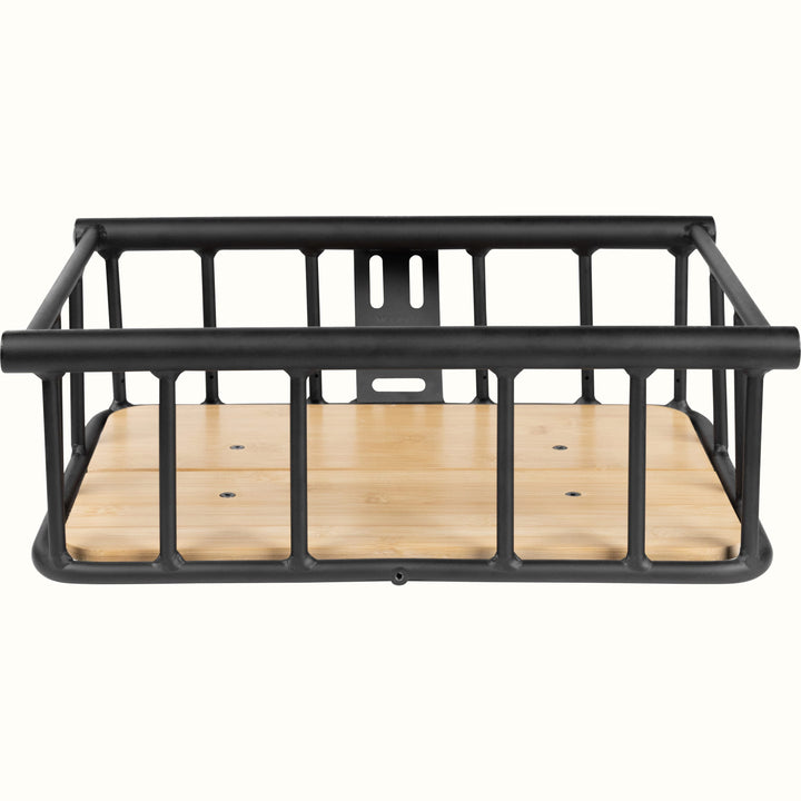 Black metal e-bike basket with wooden base on a white background.