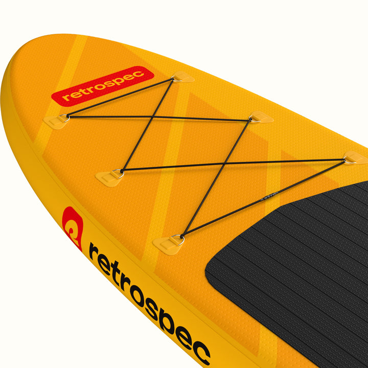 A closeup of the nose of the Weekender Inflatable Paddle Board with a 6 point bungee for storage and a 'retrospec' logo.