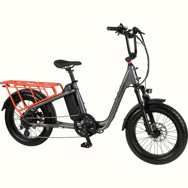 Gray Roo Rev XL electric cargo bike with an orange rear rack on a white background.